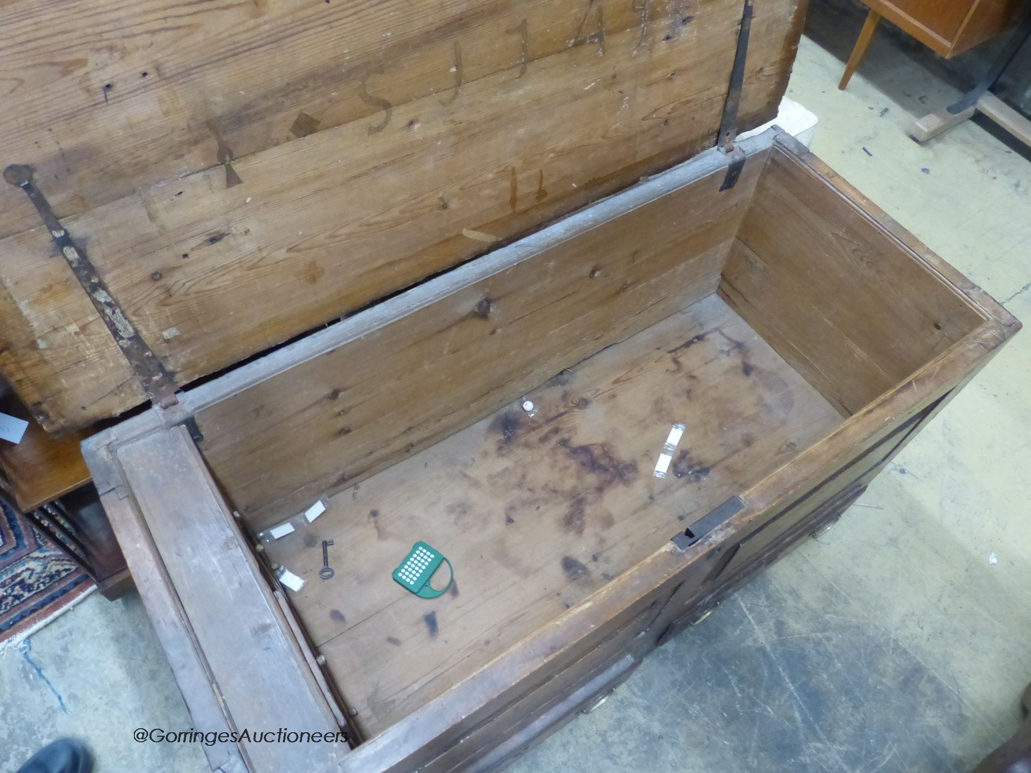 An 18th century pine mule chest, L.117cm D.49cm H.68cm